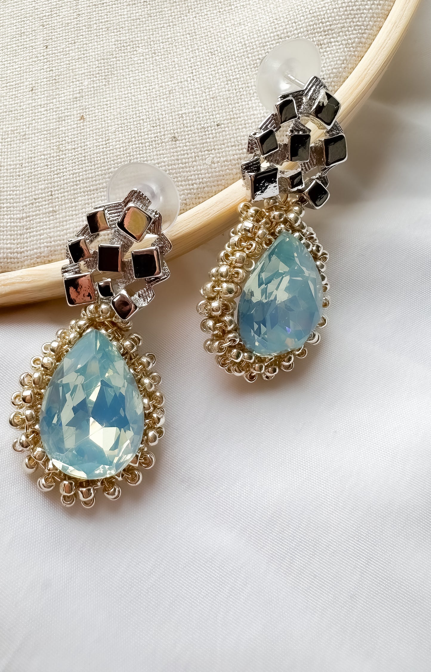 Silver embroidered earrings